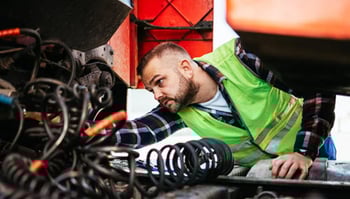 man working on truck
